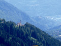 Panorama dalla Valle dei Mcheni verso Pergine: la Chiesa di San Felice e il castello in lontananza