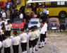 Banda di Vigo di Fassa e vecchie autovetture